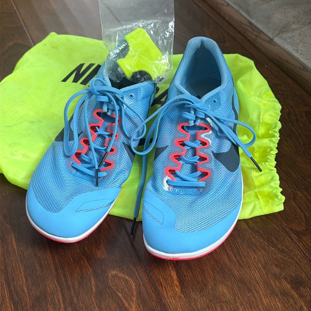 Nike running shoes worn one time. Comes with everything included in picture.